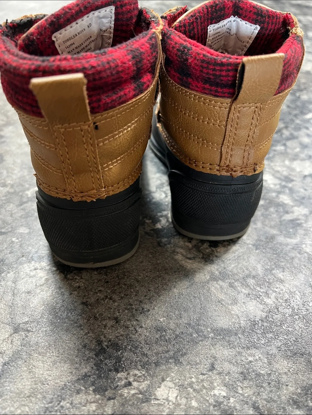 Magellan Outdoors Kids Tan and Black Waterproof Snow Boots with Red Lining